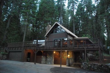 Outside view of the Big Pine cabin and trees